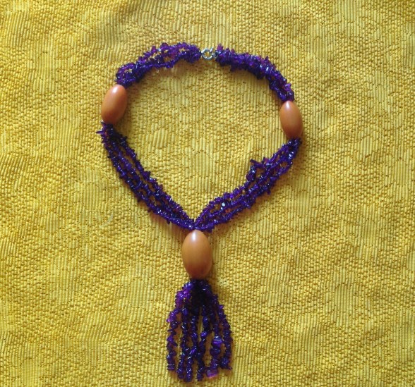 OBIM STYLE IS INNATE- necklace designed by Eeefy Amber is found in Bauchi State, Nigeria Amethyst is from the luxurious climes of Plateau State, Nigeria HEALING PROPERTIES:  Amber aides memory loss, purifies the body, elevates headaches and bone and hart problems.. Known for its stress relieving and calming properties. Amethyst aides in the reduction of insomnia, arthritis, pain relief and circulatory issues.  It is considered the gemstone of meditation, peace balance, courage and inner strength.