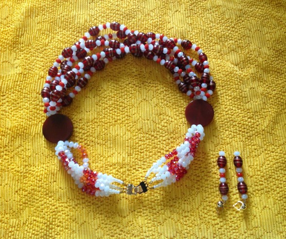 CHI -  STYLE IS INNATE - Necklace designed by Eeefy Agate Stone is From the luxurious climes of the Plateu State of Nigeria Glass bead  is produced in Niger State of Nigeria Crystals made in China Healing properties of AGATE:  It is a stone of strength. Increases energy, enhances creativity, gives courage, self confidence, emotional strength and dispels fear...