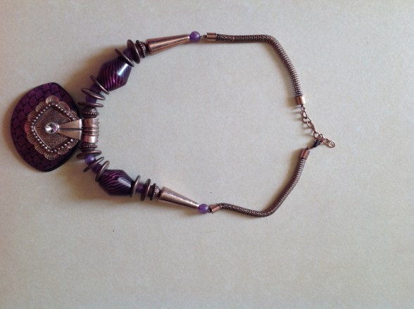 ELA STYLE IS INNATE necklace designed by Eeefy Plastic bead is made in BIDA Niger State 