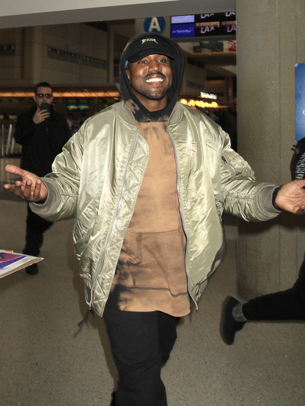 Kanye West is all smiles with arms wide open as he catches a flight out of Los Angeles.  The iconic rapper was seen at LAX making his way out of town the day after the 2016 Golden Globe awards. 

Pictured: Kanye West
Ref: SPL1207271  110116  
Picture by: Sharky / Splash News

Splash News and Pictures
Los Angeles: 310-821-2666
New York: 212-619-2666
London: 870-934-2666
photodesk@splashnews.com
