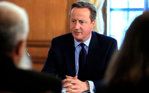 File photo dated 13/10/15 of Prime Minister David Cameron chairing the first meeting of his new Community Engagement Forum, as he has pledged £5 million of funding for groups trying to root out the "poison" of extremist ideology in British communities. PRESS ASSOCIATION Photo. Issue date: Sunday October 18, 2015. The Prime Minister said the money for local campaigns and charities this year would help prevent the "seed of hatred being planted in people's minds". See PA story POLITICS Extremism. Photo credit should read: Jonathan Brady/PA Wire